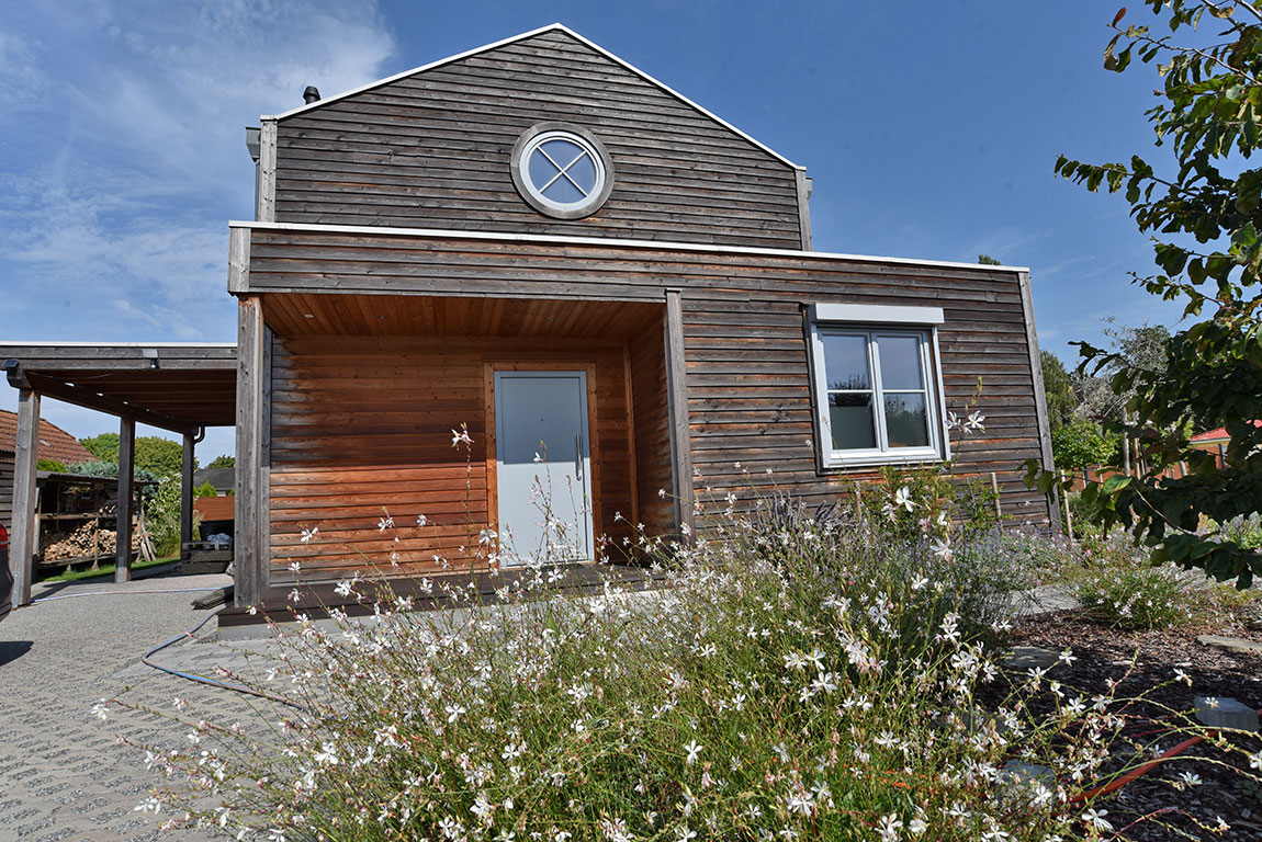 Einzigartiges Einfamilien-Holzhaus mit moderner Ausstattung + Bauland für weiteres EFH