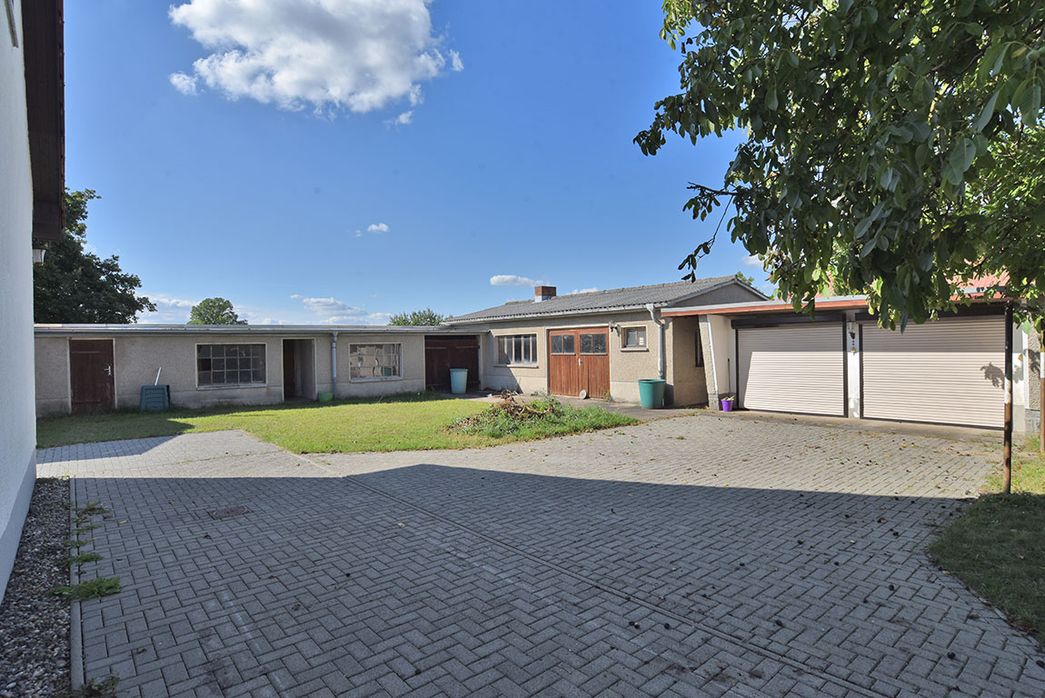 Einfamilienhaus mit multifunktionalem Nebengelass / Werkstatthalle in Rathenow